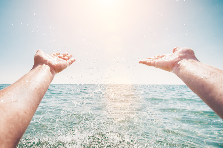 The joy of swimming in the sea - spraying water with your hands